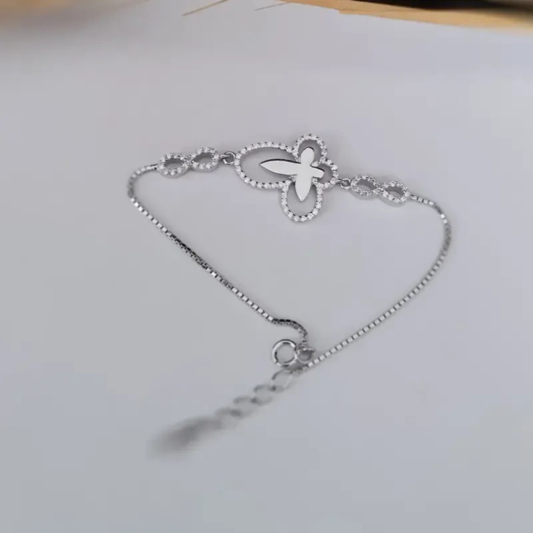دستبند نقره زنانه طرح پروانه عیار 925 با روکش طلا سفید